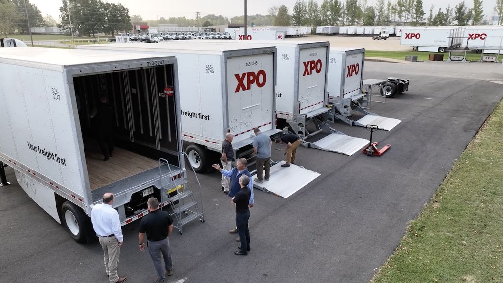 Leaders from XPO inspect trailers during the company’s annual Spec Review.