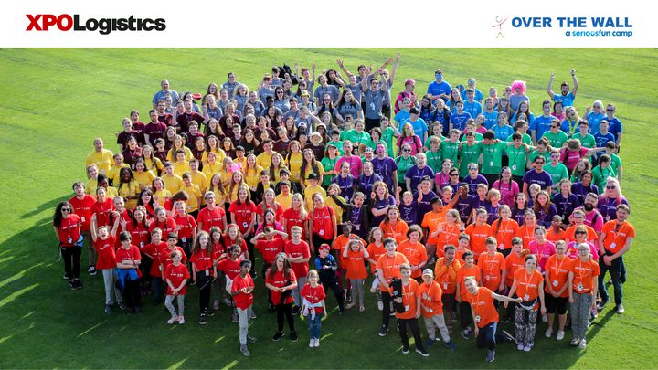 XPO Logistics Delivers for Children Across the UK as Over The Wall Camps Reopen The Over the Wall team stands with their children in a group picture