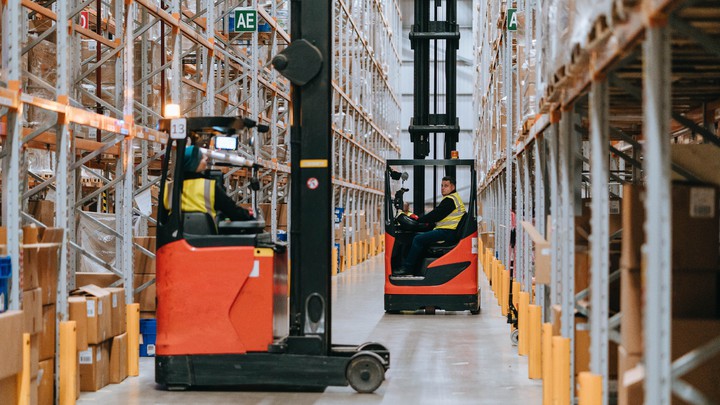 Glen Dimplex Renews with XPO Warehouse operator on a forklift