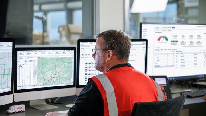 FreightTech 100 Employee at computer screen