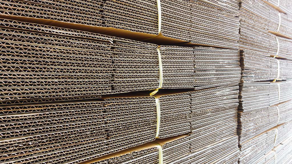 Reems of cardboard stacked together